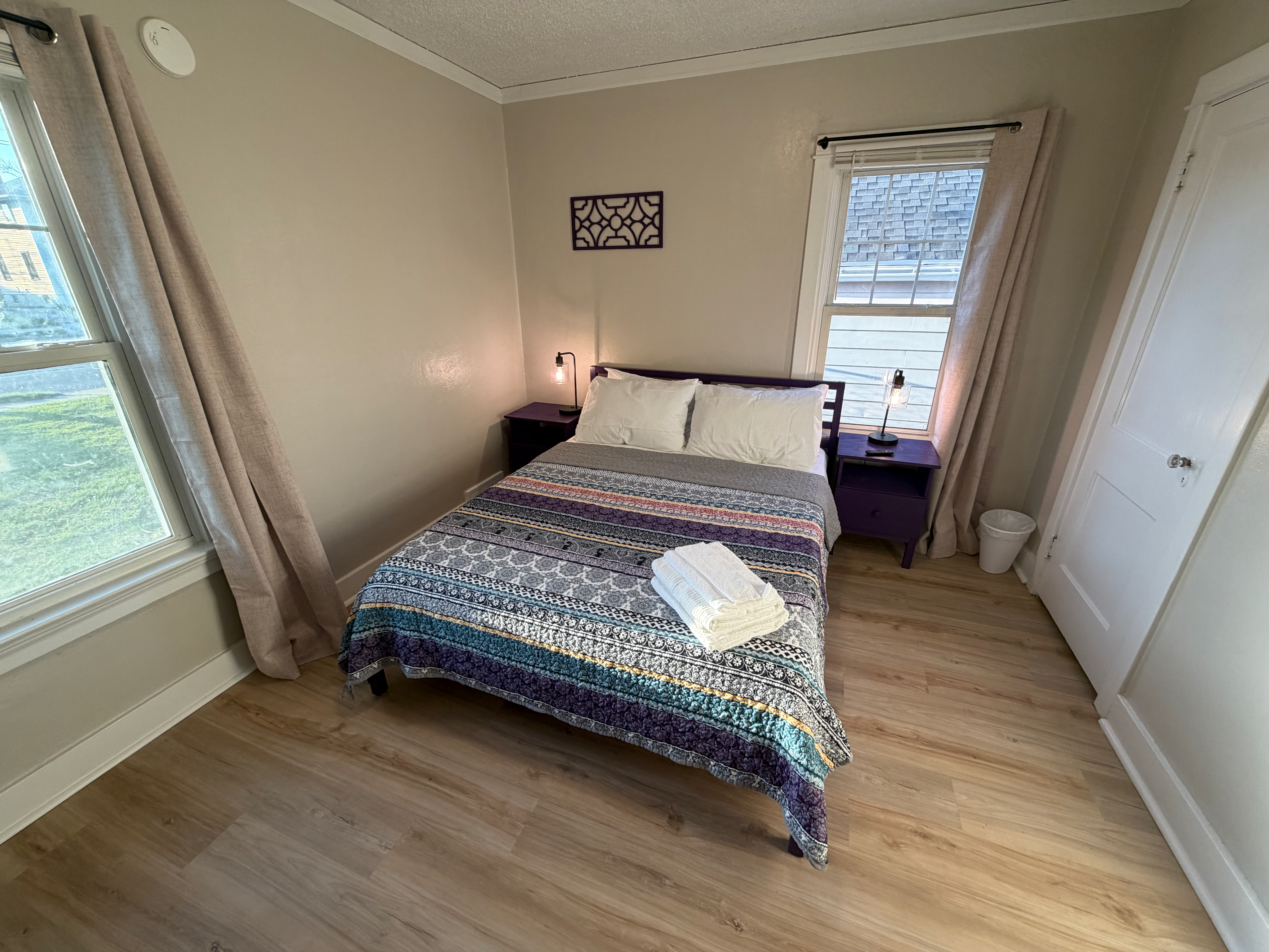 Comfortable queen bedroom at The Land of Cleve furnished rental, Dayton OH