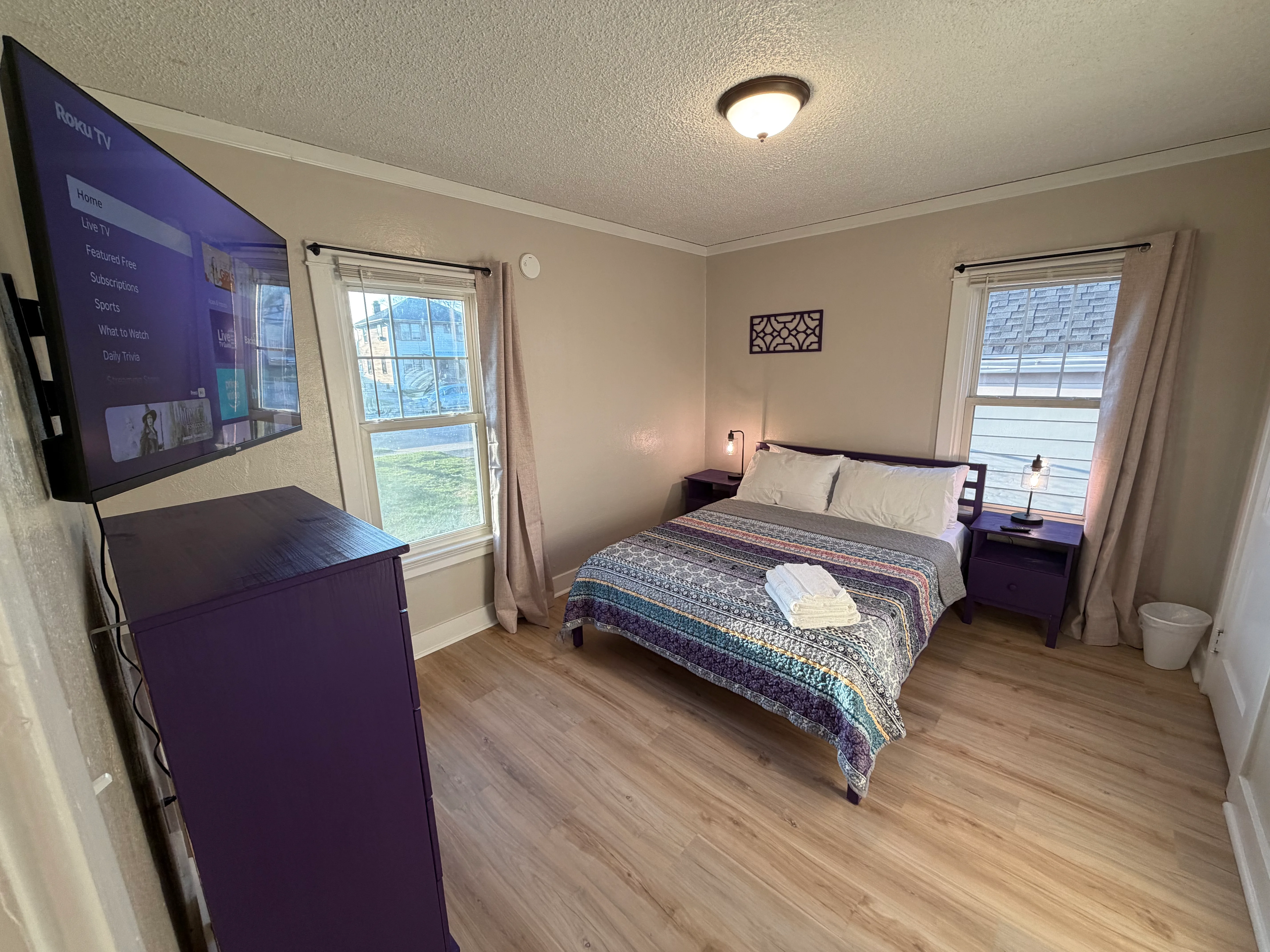 Bedroom 1 — queen bed at The Land of Cleve, Dayton OH