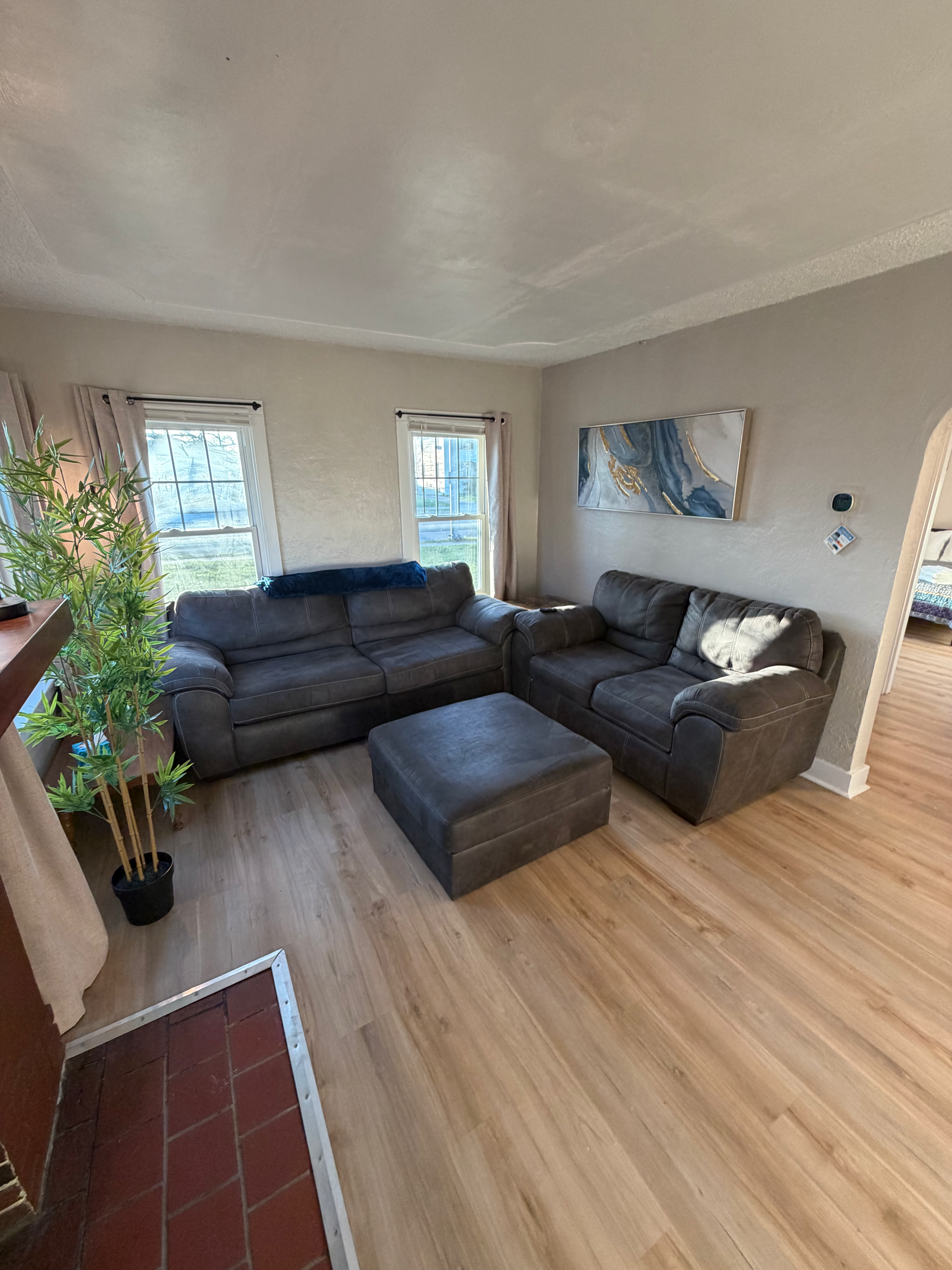 Spacious living room with sectional sofa at The Land of Cleve, Dayton OH